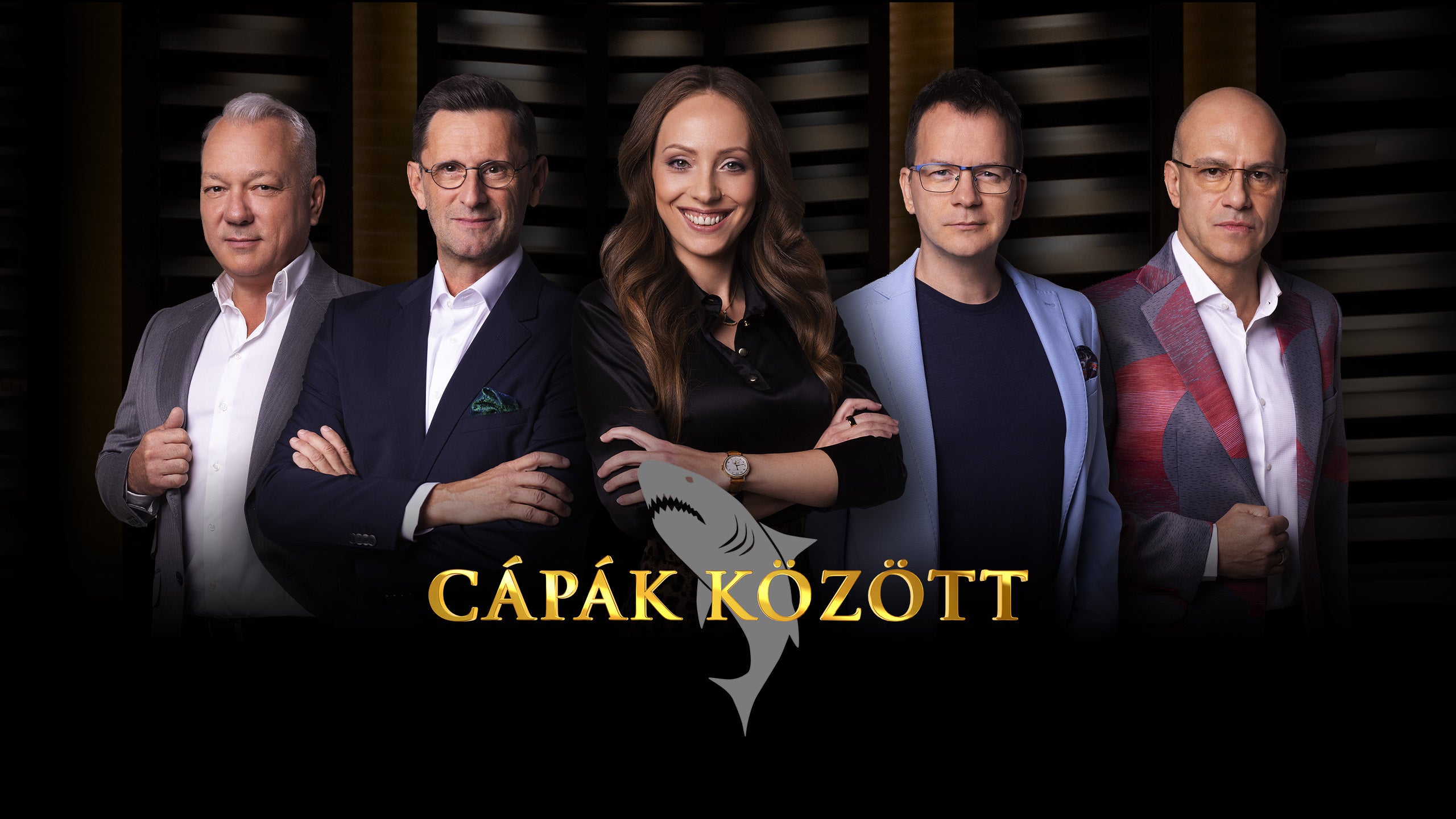 Cápák között