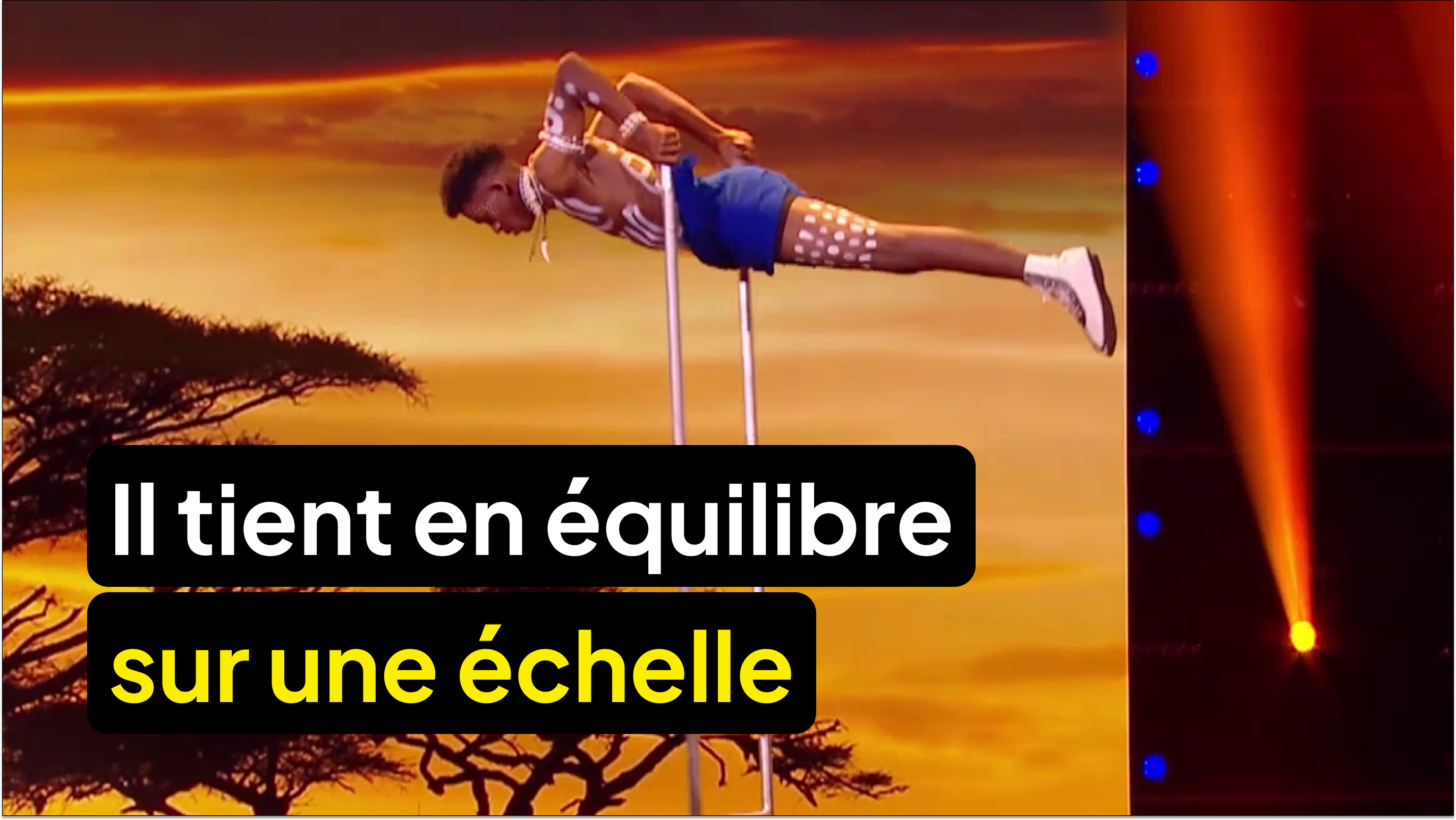 Il tient en équilibre sur une échelle