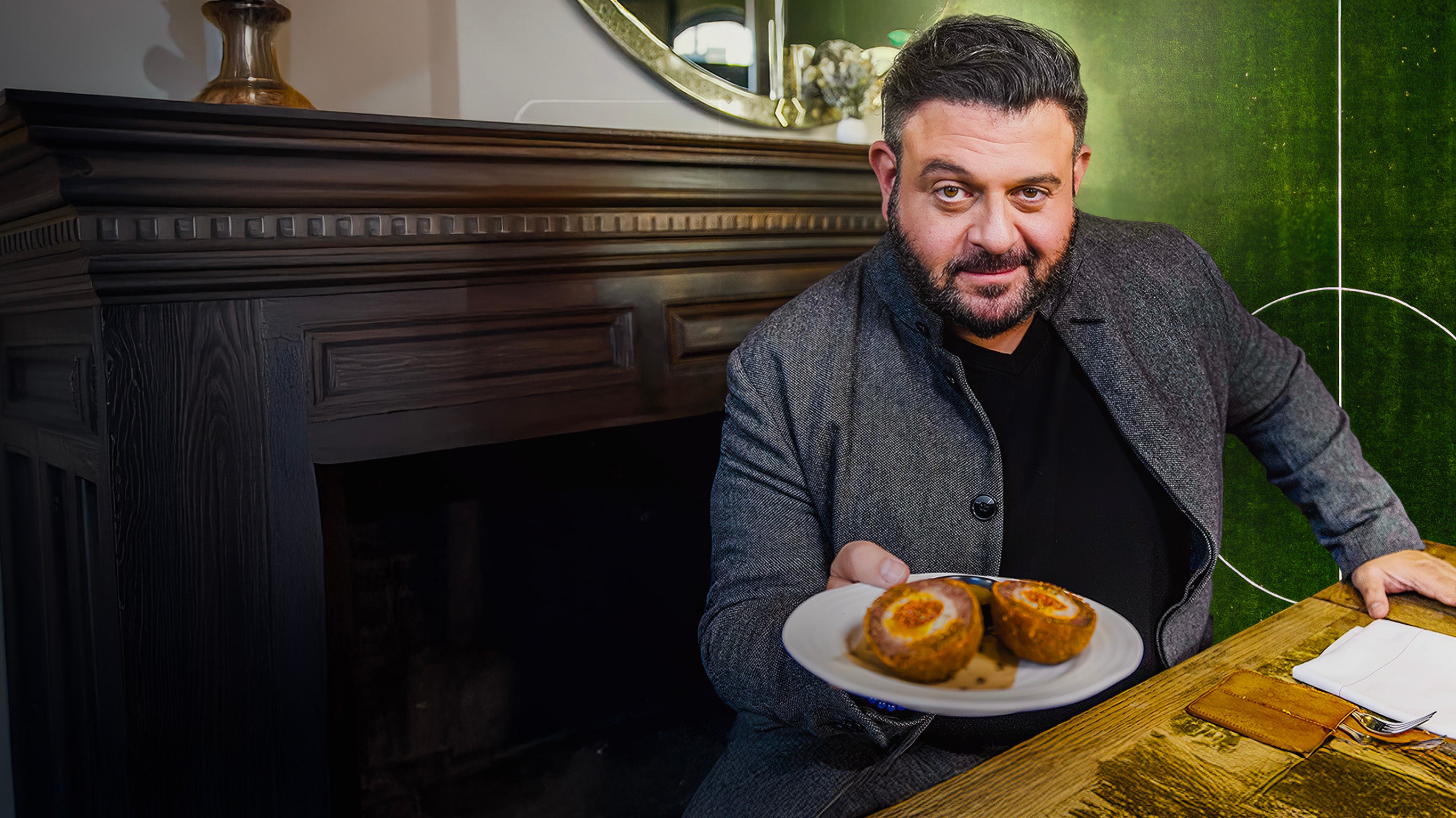Adam Richman eats football